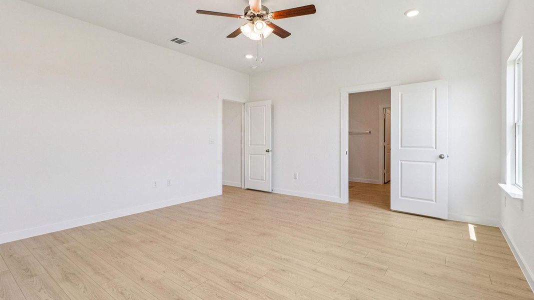 Spacious, unfurnished interior of a new home in Monarch Ranch, Manor (Image 12).