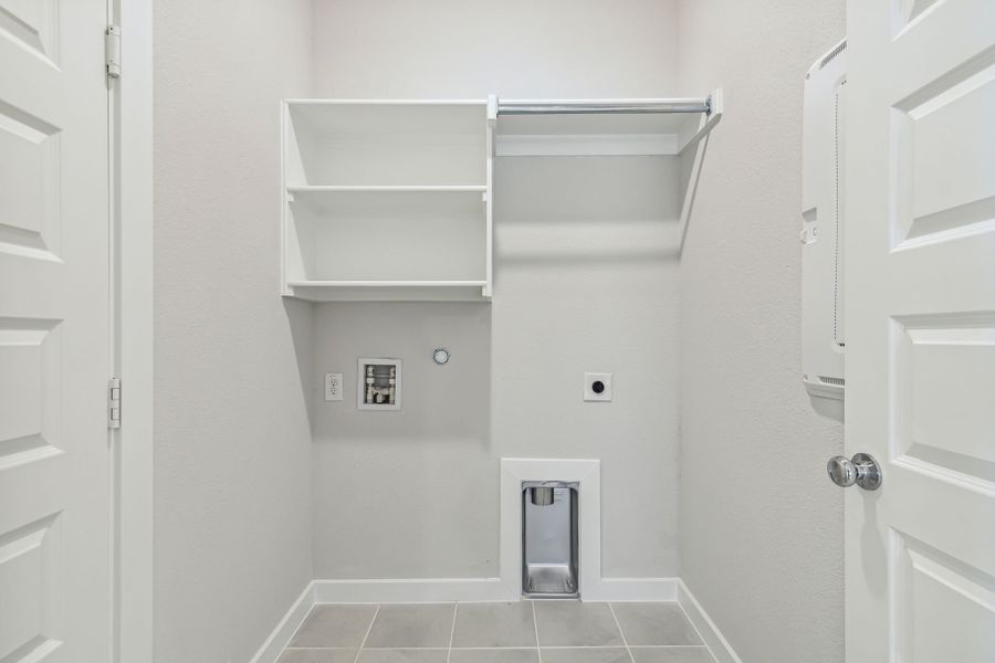 Utility Room in the Jade II home plan by Trophy Signature Homes – REPRESENTATIVE PHOTO Utility Room in the Jade II home plan by Trophy Signature Homes – REPRESENTATIVE PHOTO