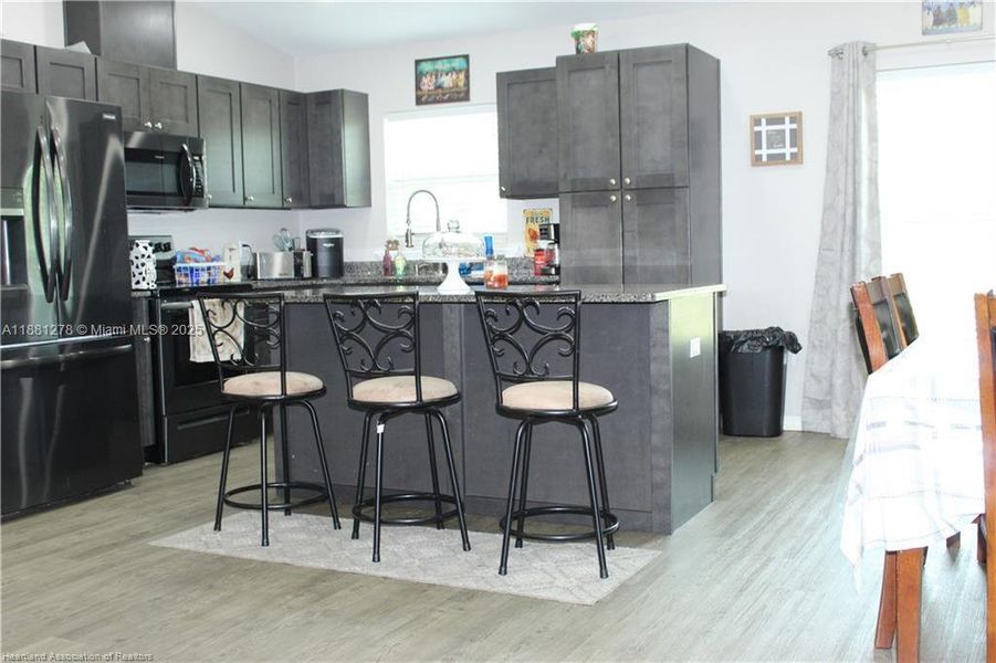 Furnished interior view inside a new home in , Zolfo Springs (Image 11).