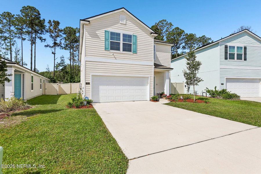 Front exterior of a new home in , St. Augustine, FL, highlighting curb appeal (Image 22).