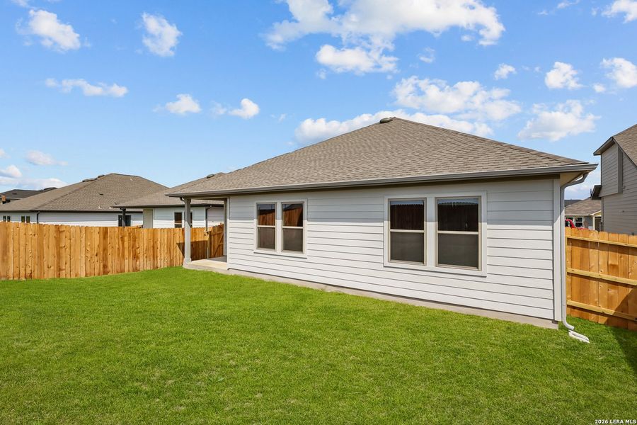 Exterior details and patio area of a home in Garden Grove, San Antonio (Image 29).