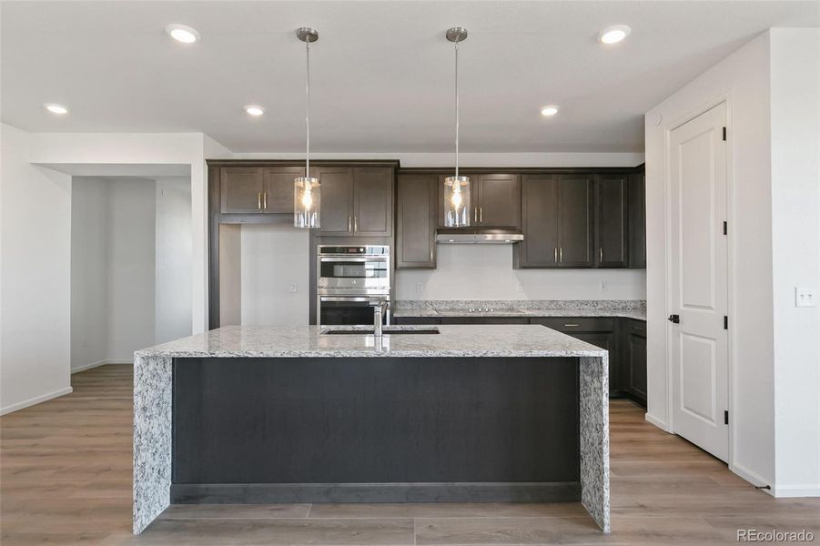 Furnished interior view inside a new home in Legato, Commerce City (Image 11).