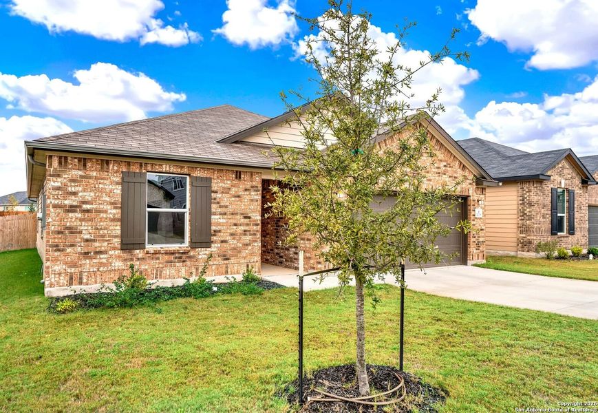 Front exterior of a new home in , San Antonio, TX, highlighting curb appeal (Image 22).