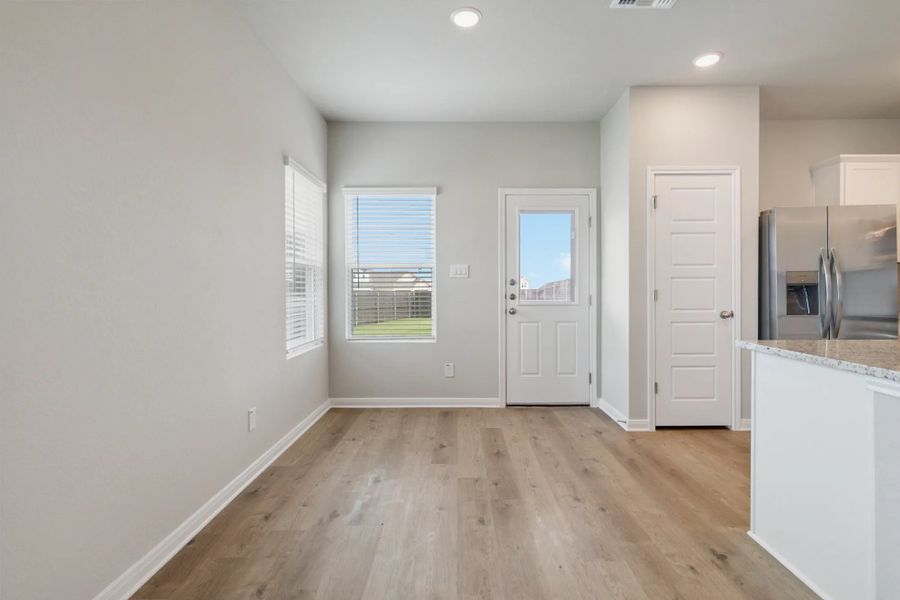 Representative unfurnished interior of a home built from the Duplex 5736 by TwoTen Communities in Emma Park, Buda (Image 18).
