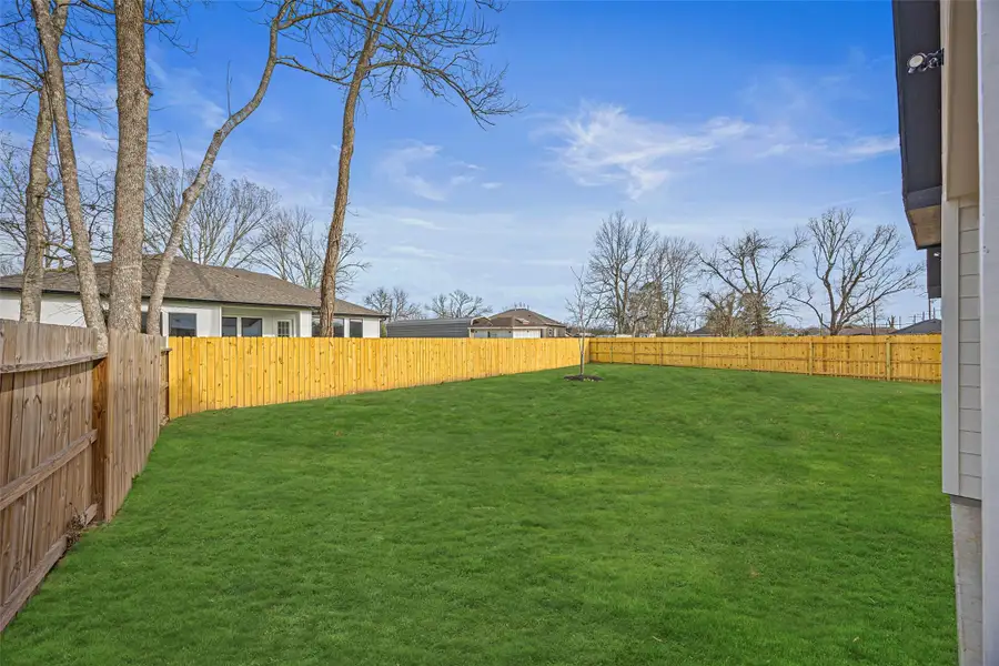 Generous fenced yard and plenty of room for a pool, playset, or garden.