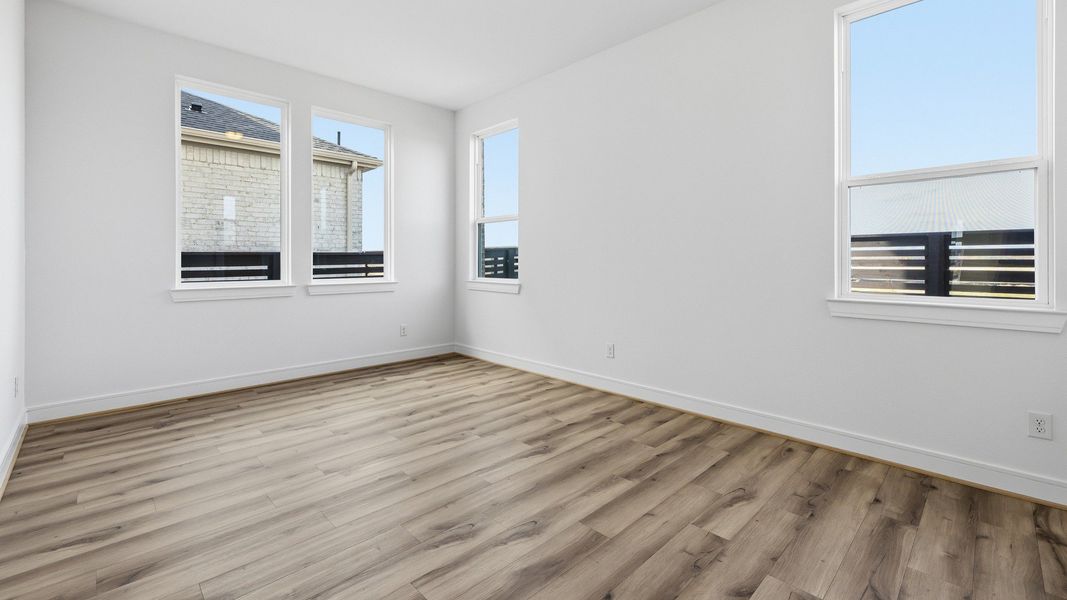Representative furnished interior of a home built from the Paloma by Brightland Homes in Bridgeland Central, Cypress (Image 13).