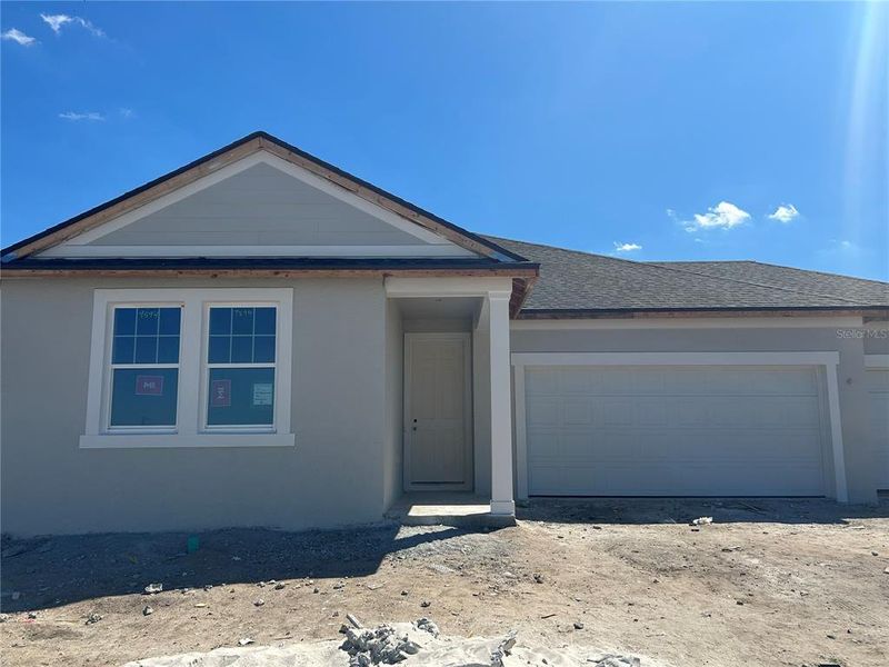 In-progress construction of a new home in Oakfield Trails Traditional, Parrish, FL (Image 12).
