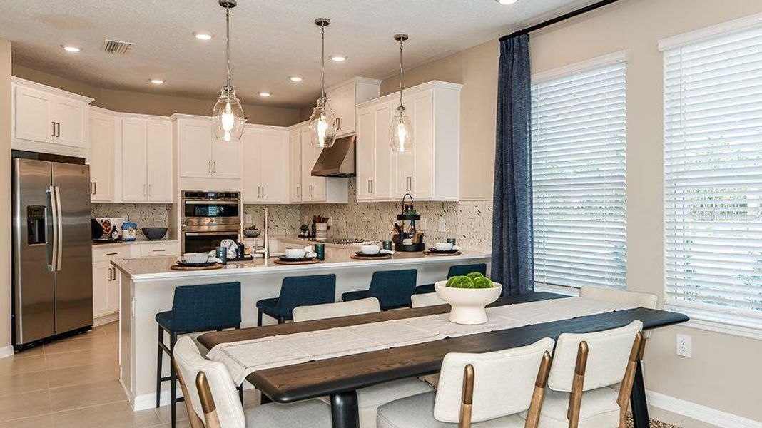Furnished interior view inside a new home in Westview Community Group Page, Kissimmee (Image 23).