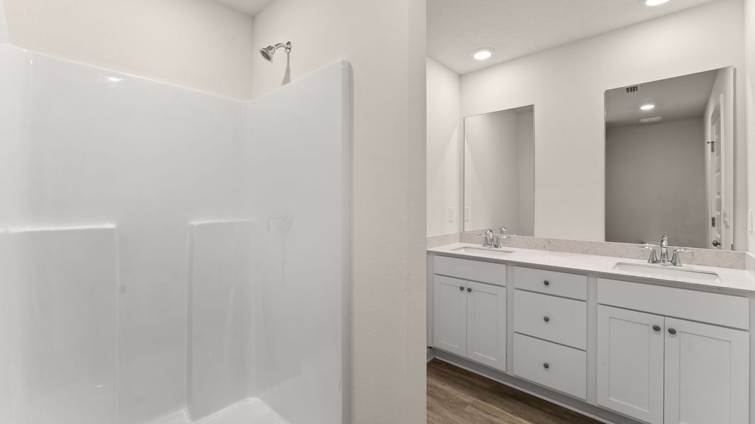 Furnished interior view inside a new home in Genoa Landing Townhomes, Freeport (Image 13).