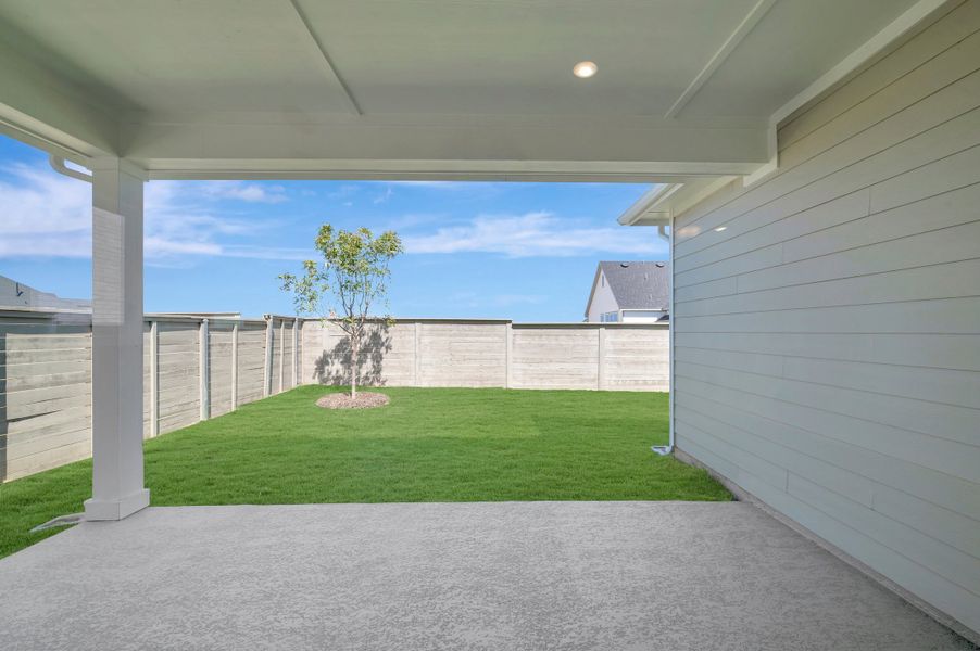 Exterior details and patio area of a home in Treeline, Justin (Image 4).