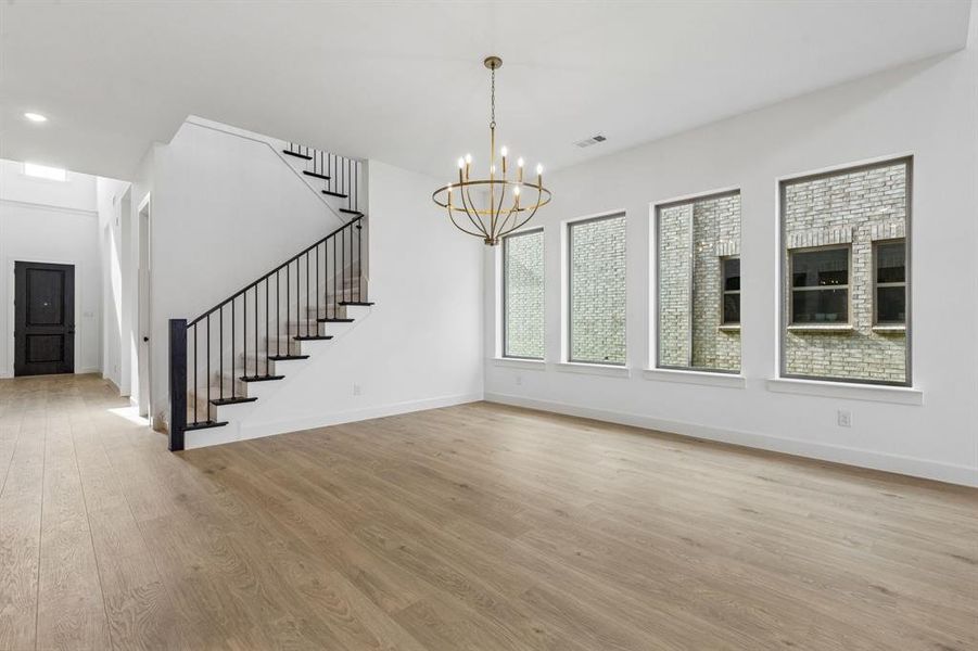 This light and bright dining area is the perfect place to host lively dinner parties or cozy family get togethers!