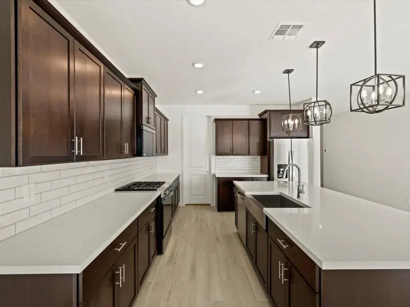 Furnished interior view inside a new home in Entrada Reserve Series, Tolleson (Image 3).