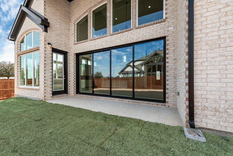 Front exterior of a new home in Cedar Ridge Estates, Grand Prairie, TX, highlighting curb appeal (Image 1). Front exterior of a new home in Cedar Ridge Estates, Grand Prairie, TX, highlighting curb appeal (Image 1).