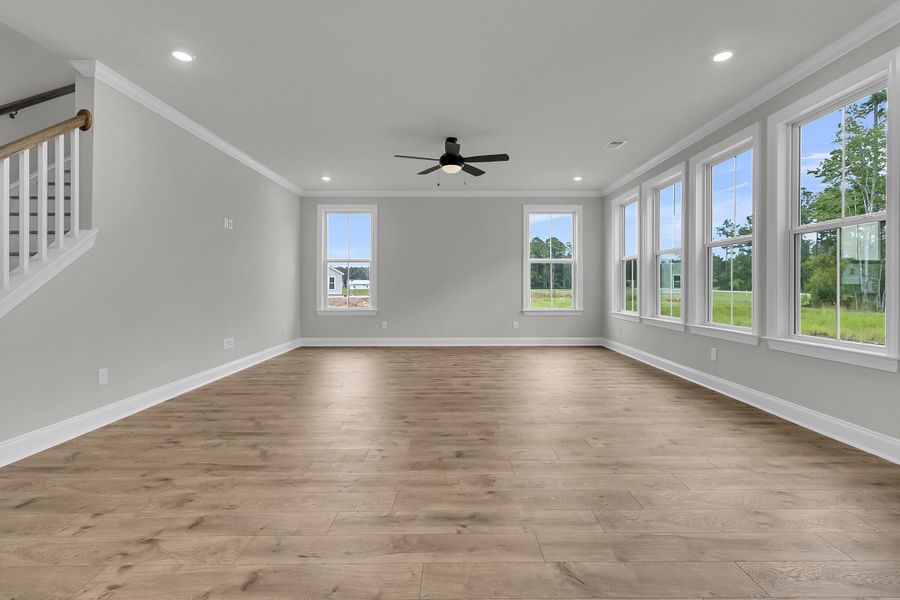 Spacious, unfurnished interior of a new home in Tidewater at Lakes of Cane Bay, Summerville (Image 26).