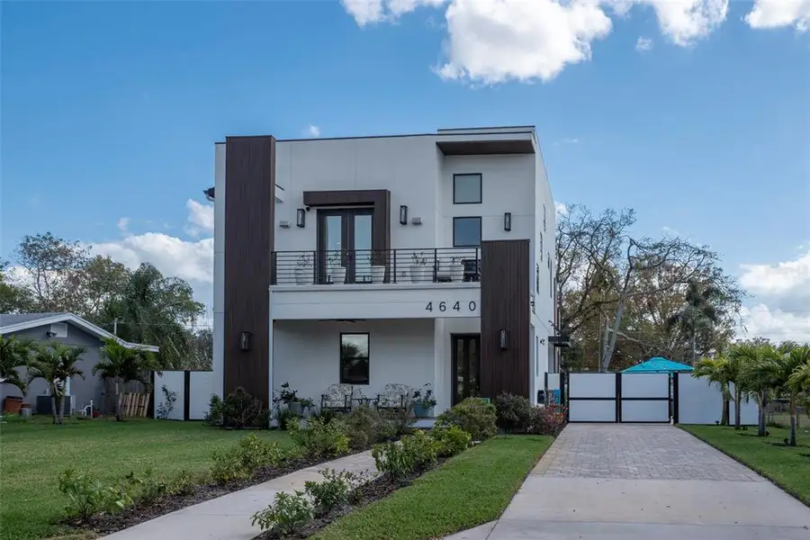 Front exterior of a new home in , St. Petersburg, FL, highlighting curb appeal (Image 2). Front exterior of a new home in , St. Petersburg, FL, highlighting curb appeal (Image 2).