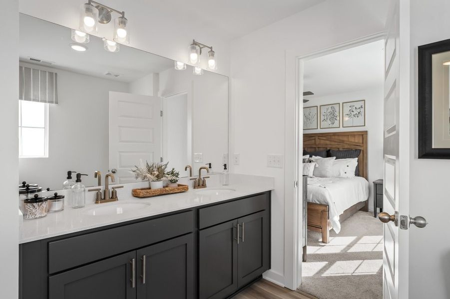 Furnished interior view inside a new home in The Towns at Red River, Gallatin (Image 30).