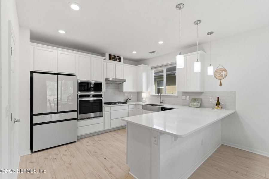 Furnished interior view inside a new home in , St. Johns (Image 9).
