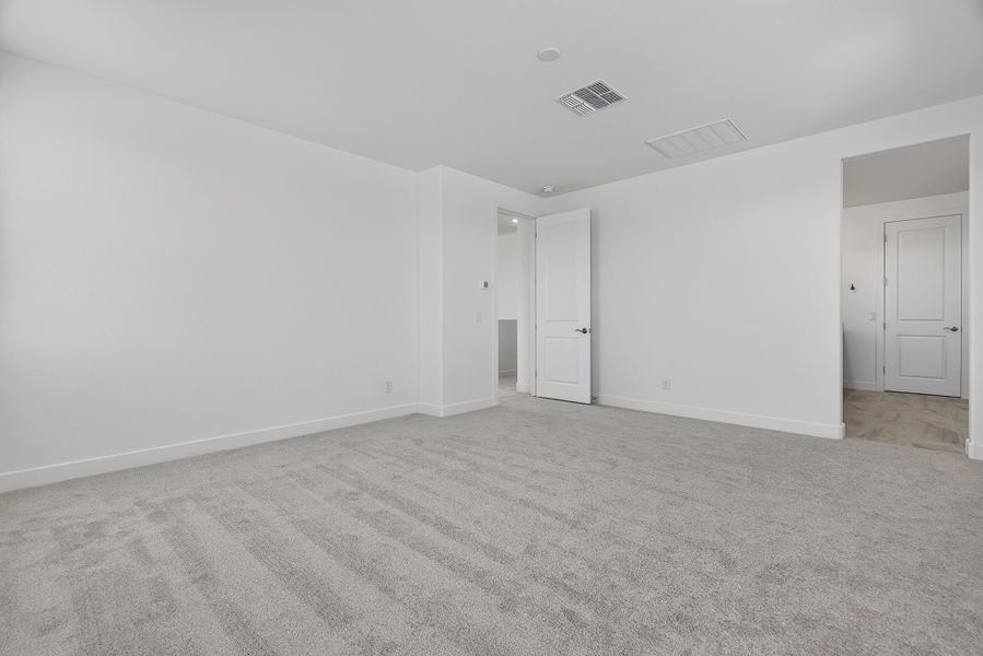 Spacious, unfurnished interior of a new home in The Grove at El Cidro, Goodyear (Image 31).