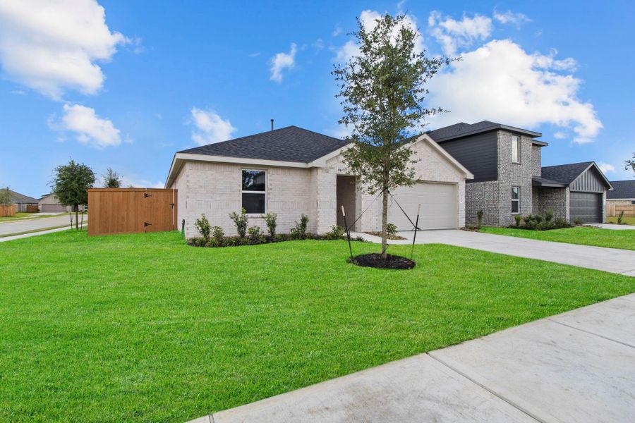 Front exterior of a new home in Cypress Green, Hockley, TX, highlighting curb appeal (Image 2). Front exterior of a new home in Cypress Green, Hockley, TX, highlighting curb appeal (Image 2).