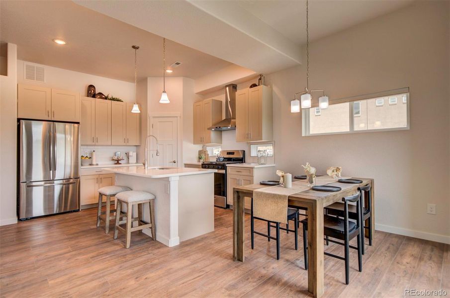 Looking into the kitchen from the edge of the living room.
