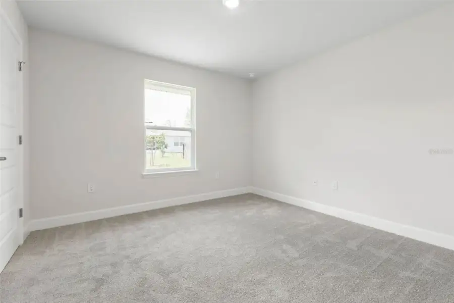 Representative unfurnished interior of a home built from the 2117 by Adams Homes in Flagler Estates, Hastings (Image 28).