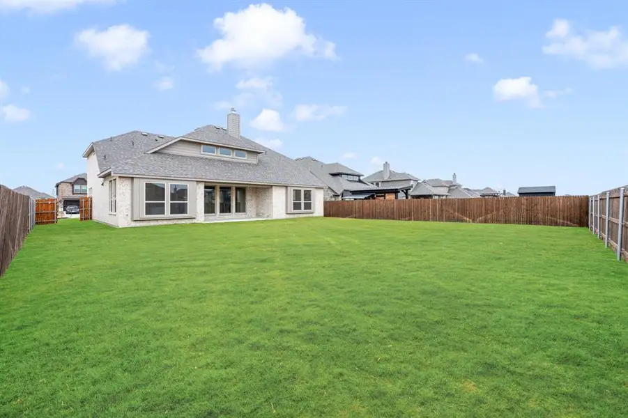 Exterior details and patio area of a home in Sunrise at Garden Valley, Waxahachie (Image 3).
