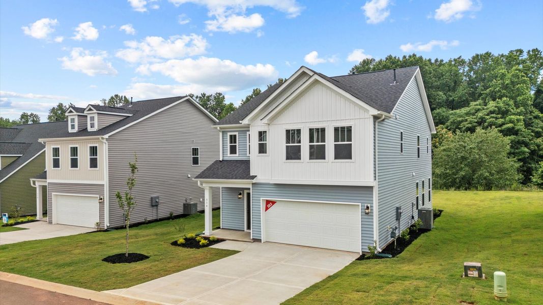 Front exterior of a new home in Spring Branch, Smyrna, TN, highlighting curb appeal (Image 20).