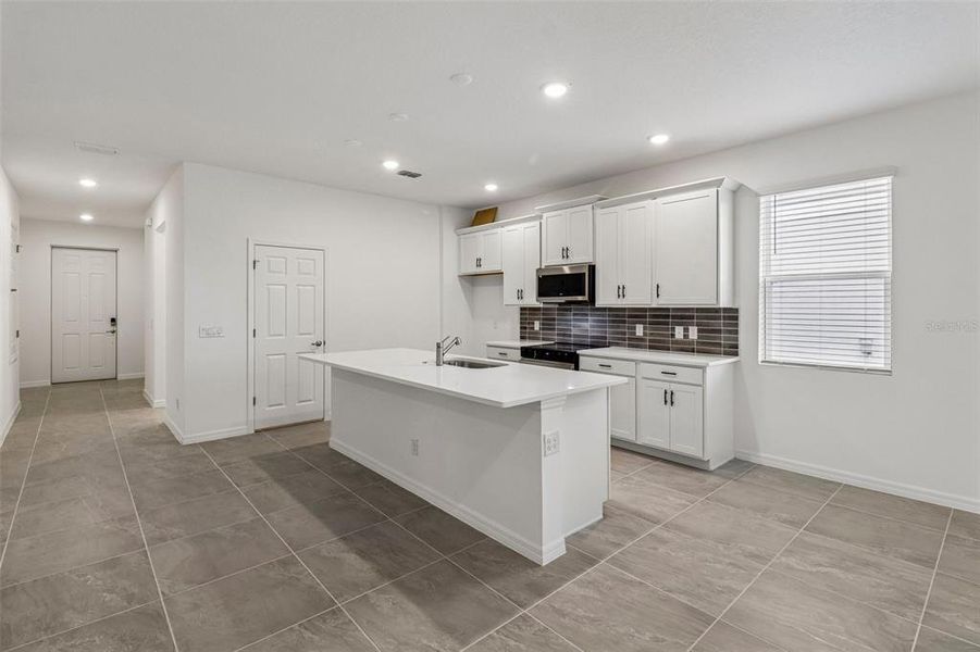 Furnished interior view inside a new home in Trinity Gardens, Deland (Image 11). Furnished interior view inside a new home in Trinity Gardens, Deland (Image 11).
