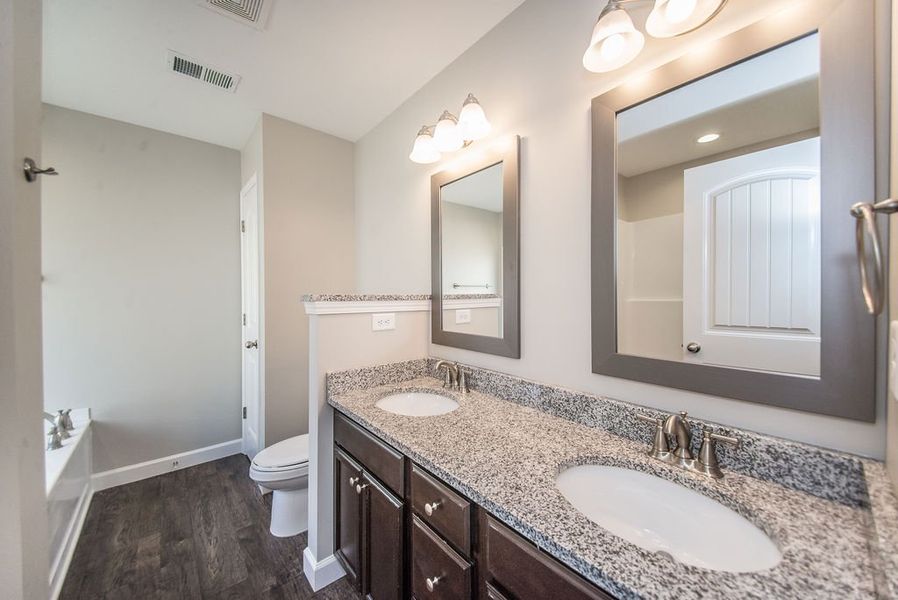 Representative furnished interior of a home built from the Bishop by Enchanted Homes in Ballentine Ridge, Lyman (Image 6).