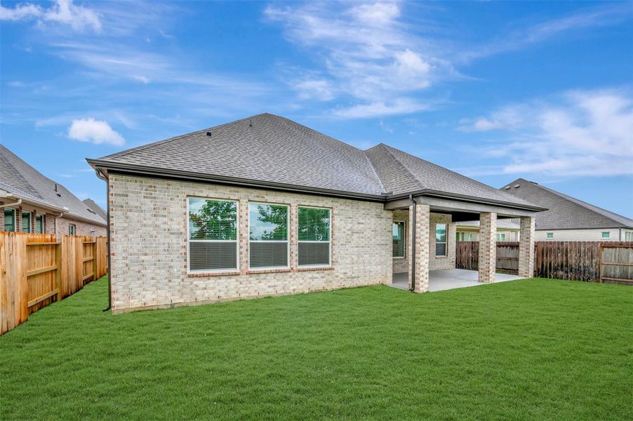 Exterior details and patio area of a home in Oakwood Estates, Waller (Image 3).