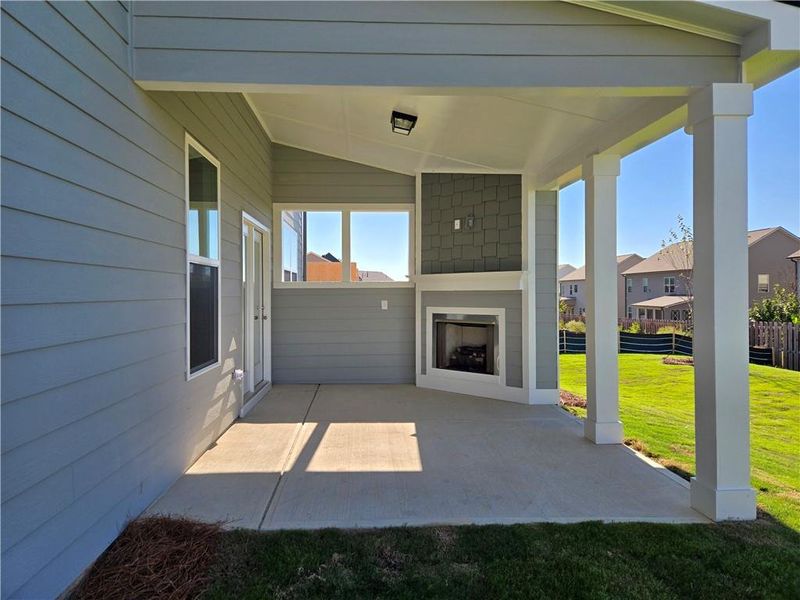 Exterior details and patio area of a home in Enclave at Logan Point, Loganville (Image 24).