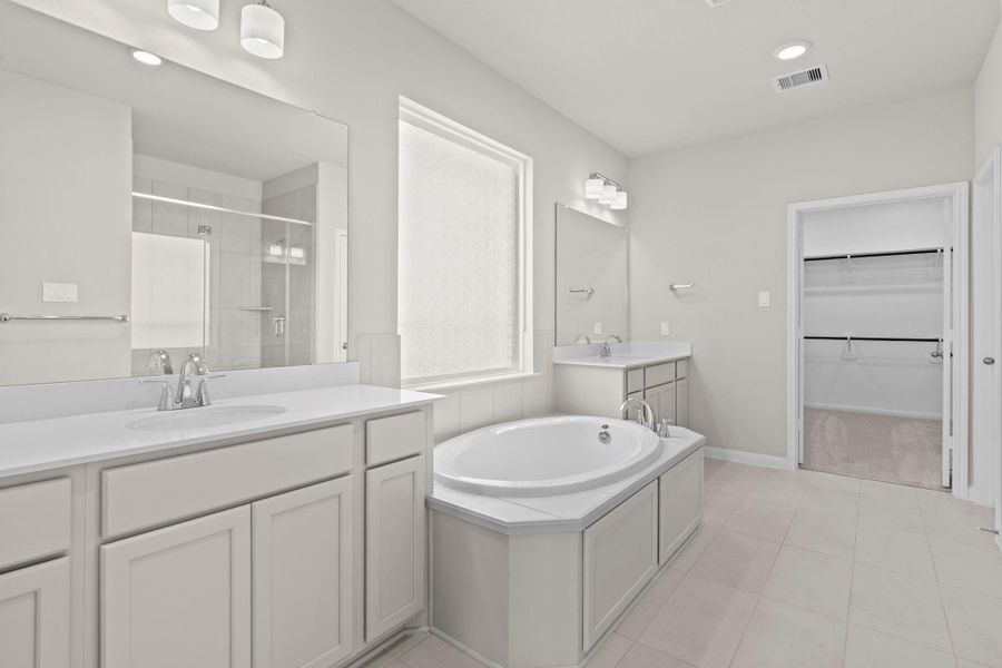 Furnished interior view inside a new home in Bridgeland, Cypress (Image 14).