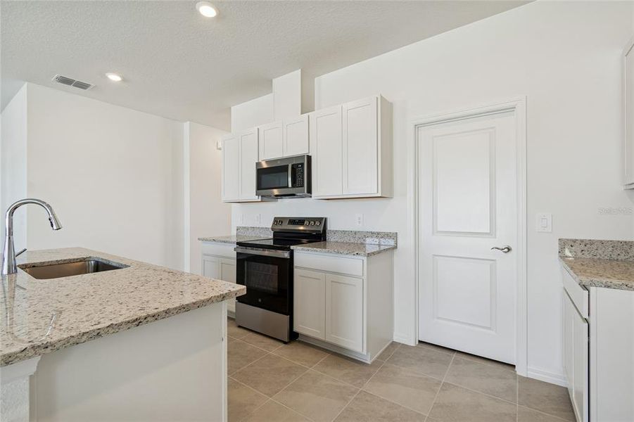 Furnished interior view inside a new home in Southpointe, Palmetto (Image 5).