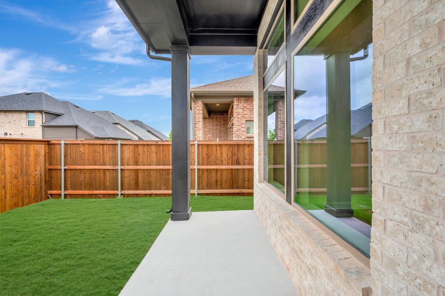 Exterior details and patio area of a home in Creekshaw – Gardens, Royse City (Image 4). Exterior details and patio area of a home in Creekshaw – Gardens, Royse City (Image 4).