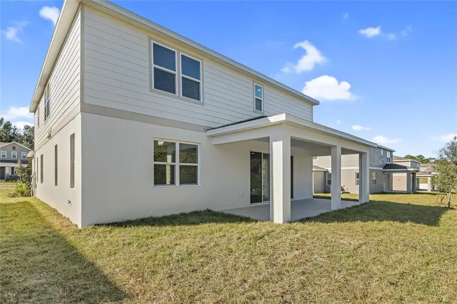 Exterior details and patio area of a home in Seasons at Wekiva Ridge, Mount Dora (Image 3). Exterior details and patio area of a home in Seasons at Wekiva Ridge, Mount Dora (Image 3).