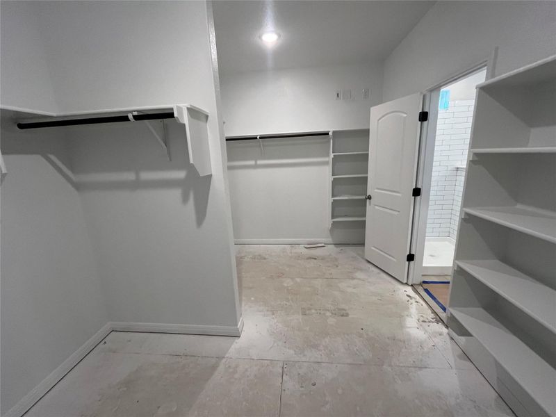 In-progress construction of a new home in The Cottages at Lariat, Liberty Hill, TX (Image 23).