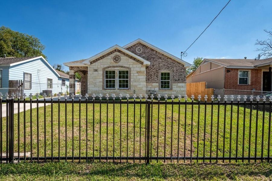 Great curb appeal with privacy driveway.