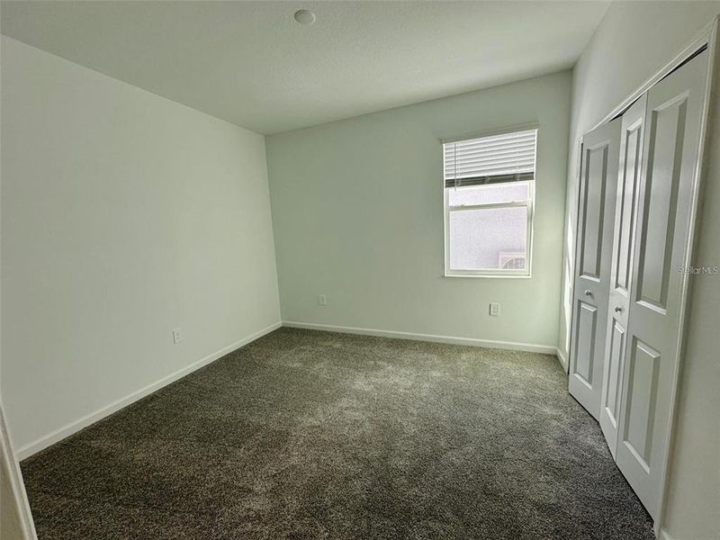 Spacious, unfurnished interior of a new home in Wellness Ridge: Estates Collection, Clermont (Image 22).