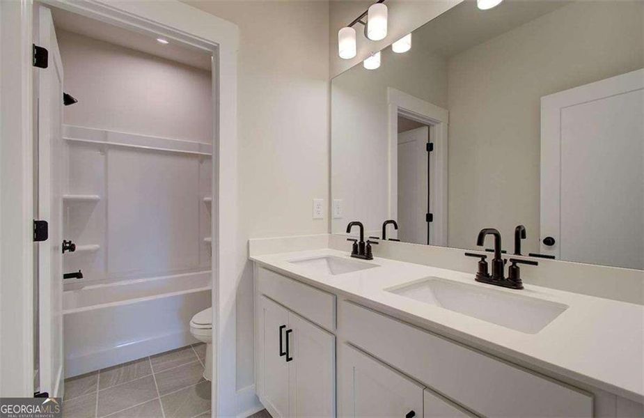 Furnished interior view inside a new home in The Paddocks at Doc Hughes, Buford (Image 14).