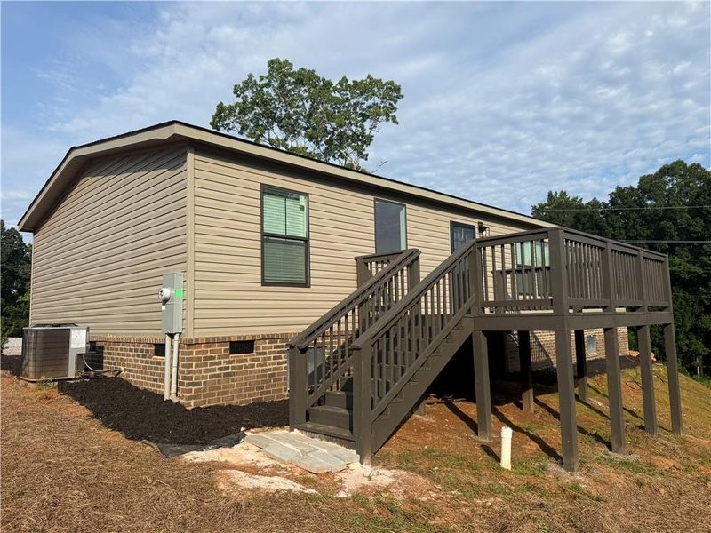 Exterior details and patio area of a home in , Clarkesville (Image 16).