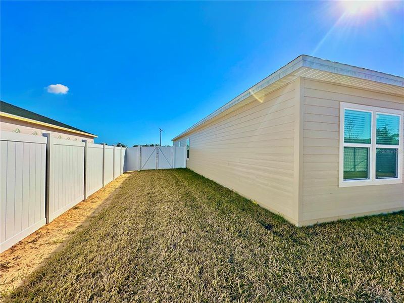 Exterior details and patio area of a home in Pioneer Ranch, Ocala (Image 29).