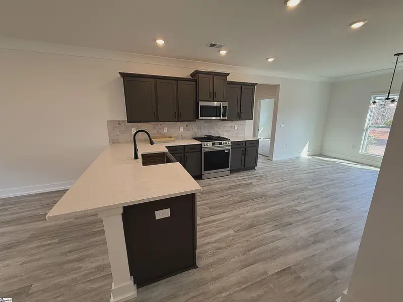 Furnished interior view inside a new home in Hidden Lake Estates, Greenville (Image 4).