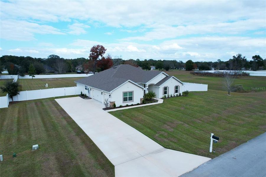 Front exterior of a new home in Dorchester, Ocala, FL, highlighting curb appeal (Image 33).