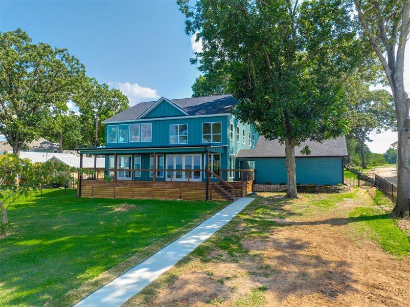 Front exterior of a new home in , Chandler, TX, highlighting curb appeal (Image 24). Front exterior of a new home in , Chandler, TX, highlighting curb appeal (Image 24).