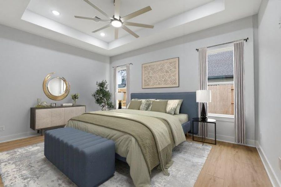 The primary bedroom showcases recessed lighting and 11-foot ceilings, while two bright windows fill the room with natural light. A built in security system control panel adds convenience, and double doorsw open directly into your private en-suite. (virtual staging)