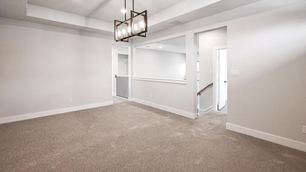 Spacious, unfurnished interior of a new home in 6 Creeks 50', Kyle (Image 17).