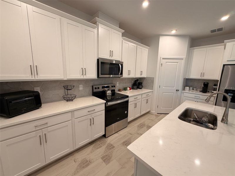 Furnished interior view inside a new home in Waterbrooke, Clermont (Image 17).