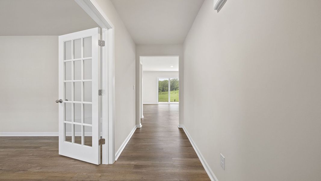 Spacious, unfurnished interior of a new home in Bentley Park, Greenwood (Image 13).