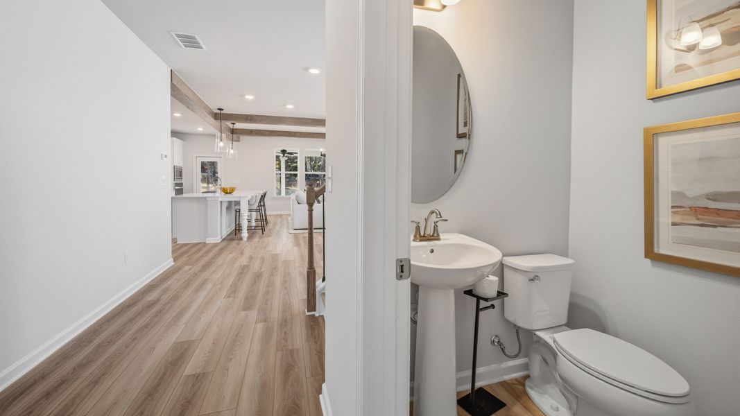 Dedicated powder room with access to first floor main living areas Dedicated powder room with access to first floor main living areas