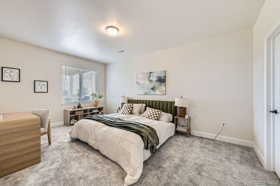 Furnished interior view inside a new home in Haskins Station, Arvada (Image 12).